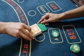 Filipino player enjoying online bingo on a mobile phone with perya games